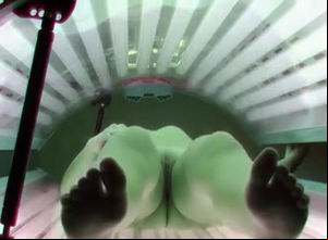 Solarium spycam nude gal masturbating.