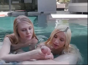 2 damsel women inhale in the pool
